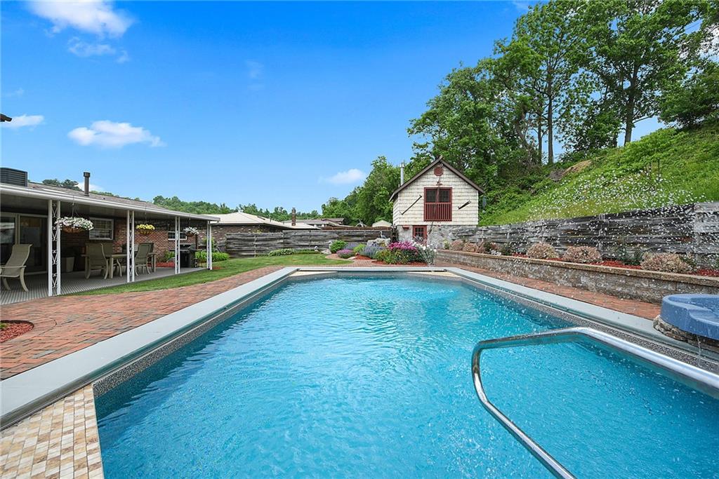 38 Manor Road Donora, PA 15033 - Photo 19 of 25 a view of a house with pool yard and balcony