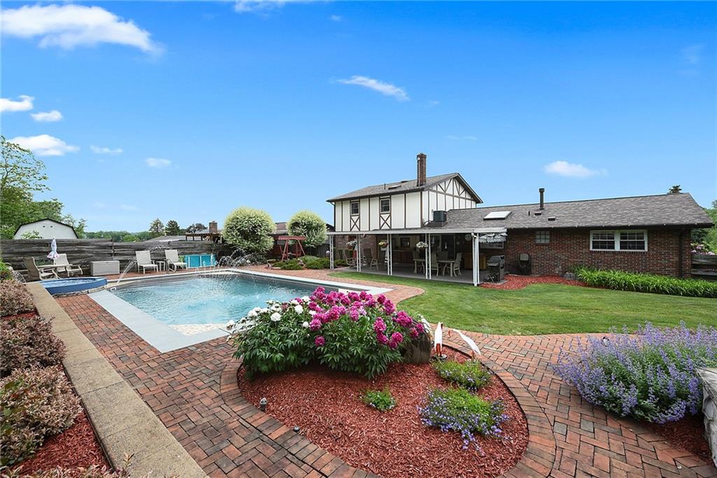 38 Manor Road Donora, PA 15033 - Photo 20 of 25 a front view of a house with garden