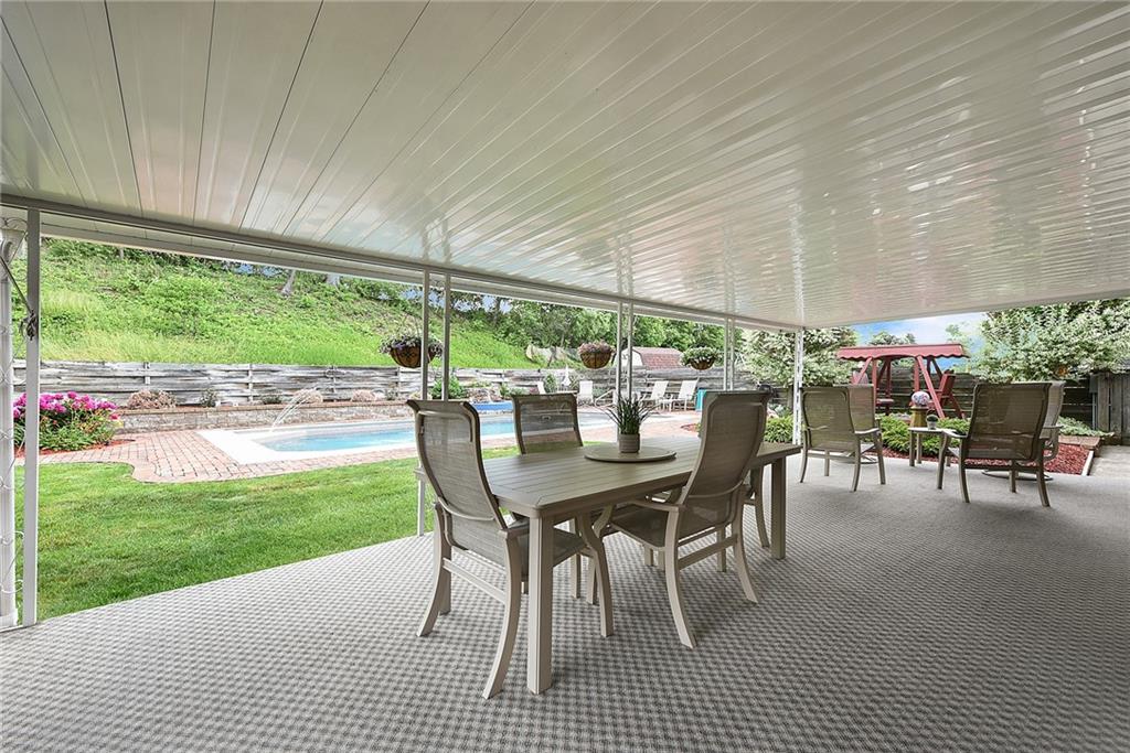 38 Manor Road Donora, PA 15033 - Photo 25 of 25 a view of a patio with a table and chairs