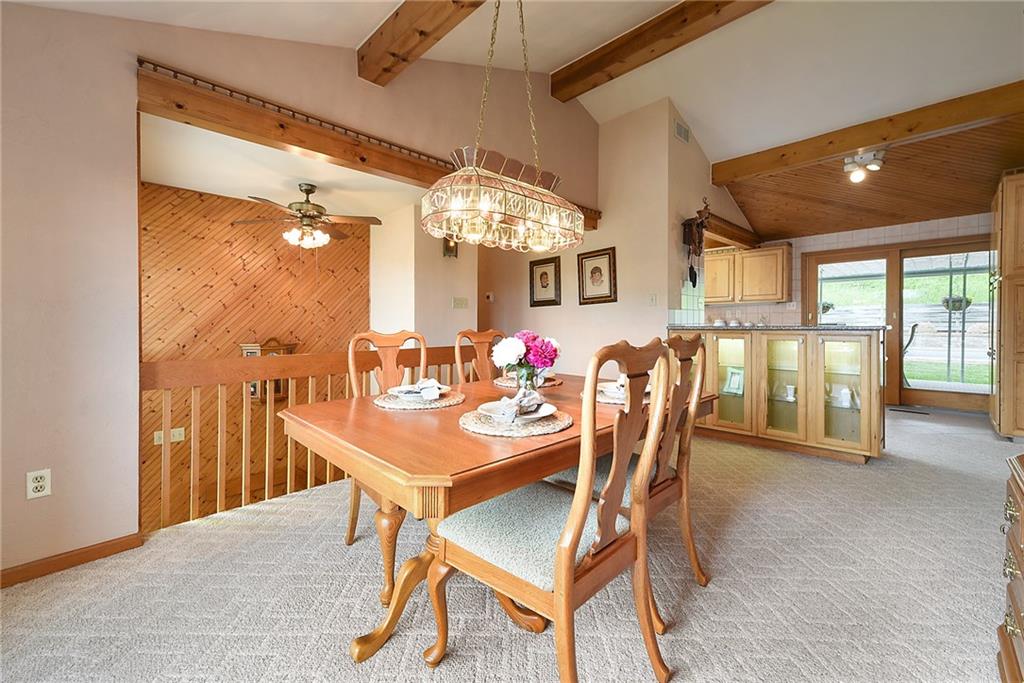 38 Manor Road Donora, PA 15033 - Photo 7 of 25 a dining room with furniture a chandelier and large window