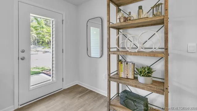 a view of front door with furniture