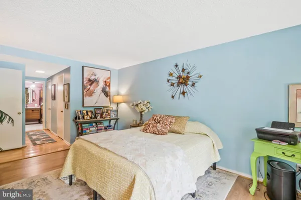 a view of a dining room with furniture and a window
