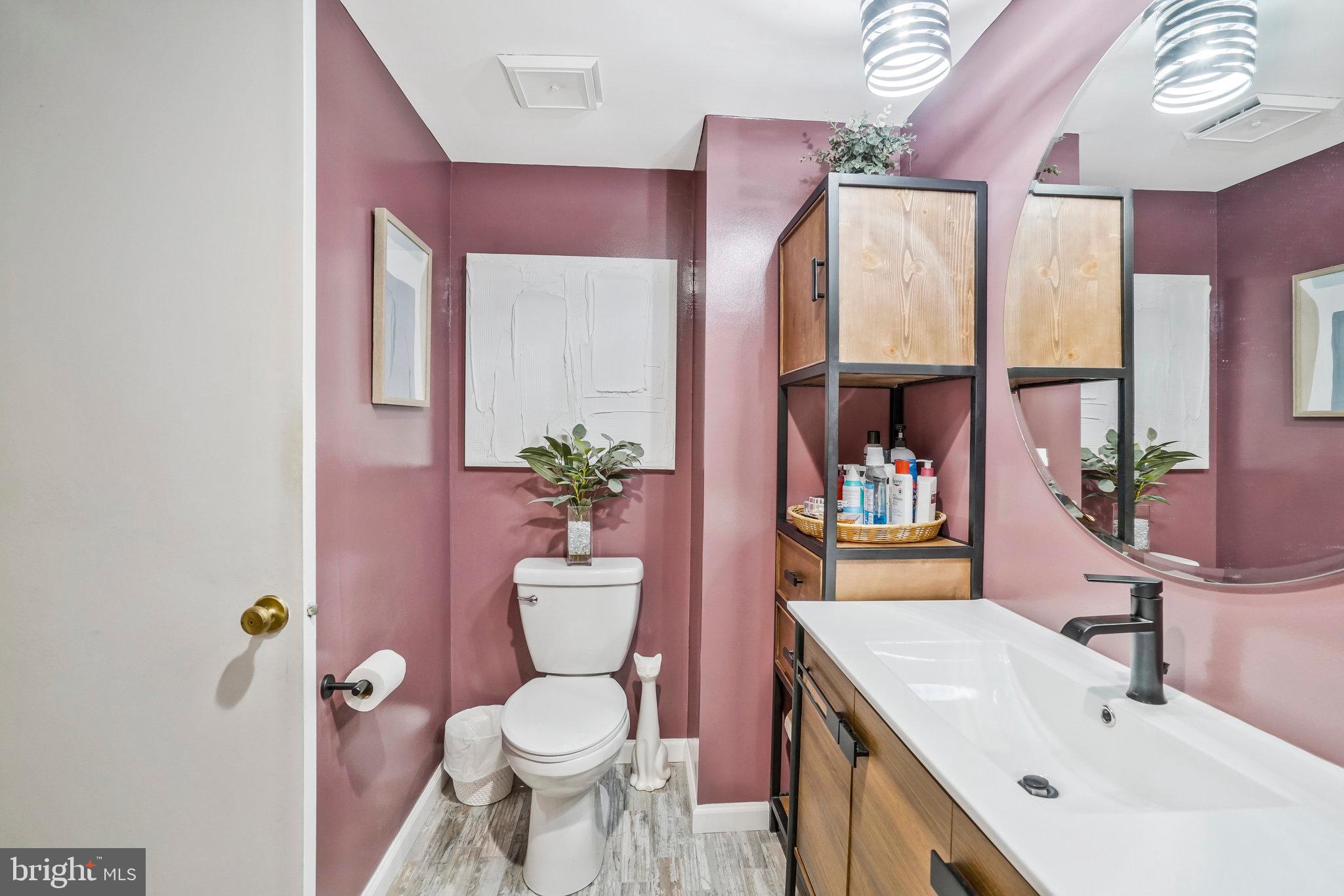 6101 Edsall Road, Unit 302 Alexandria, VA 22304 - Photo 27 of 59 a bathroom with a sink toilet and shower