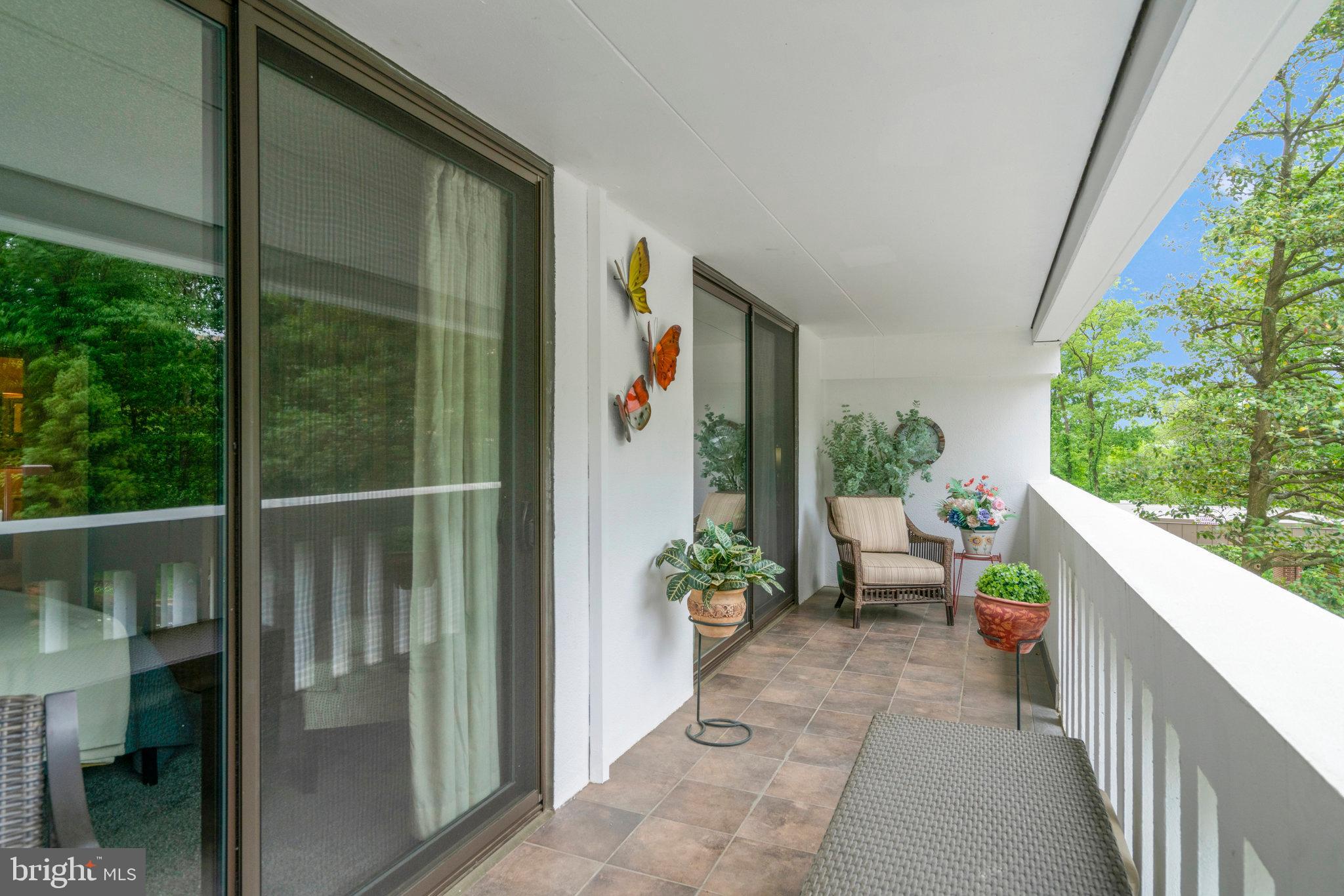 6101 Edsall Road, Unit 302 Alexandria, VA 22304 - Photo 37 of 59 a view of a balcony with chairs