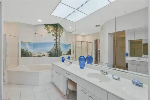 a bathroom with a bathtub and shower