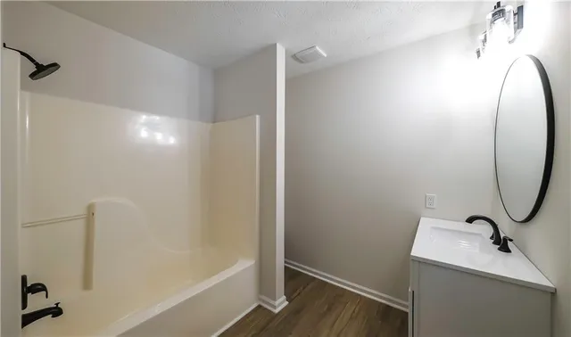 a bathroom with a bathtub