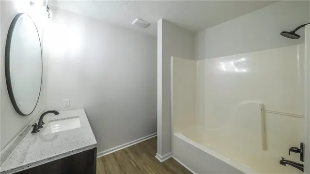 a bathroom with a bathtub