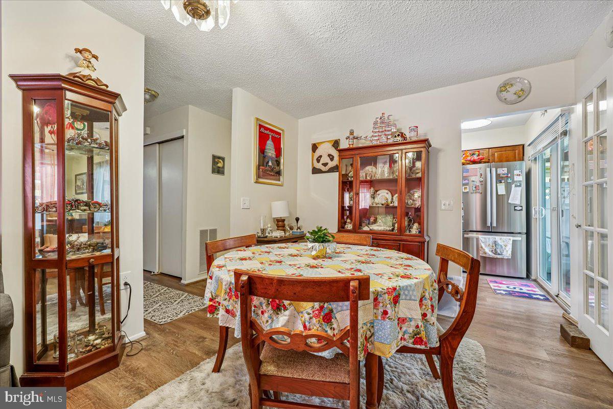 3703 Liverpool Place, Unit 37A Silver Spring, MD 20906 - Photo 5 of 37 Charming dining area with vintage flair.