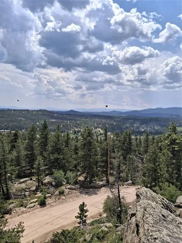 a view of a city with mountains