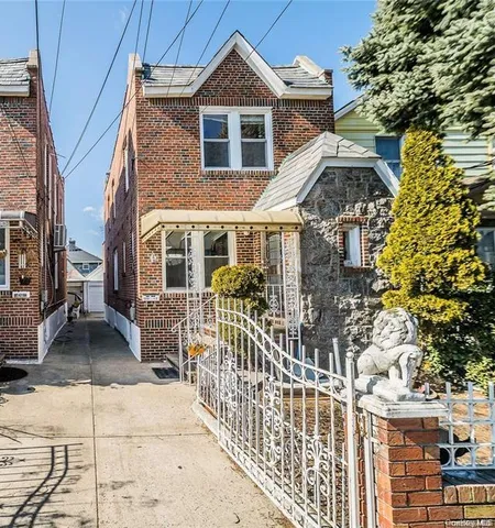 a front view of a house with glass windows