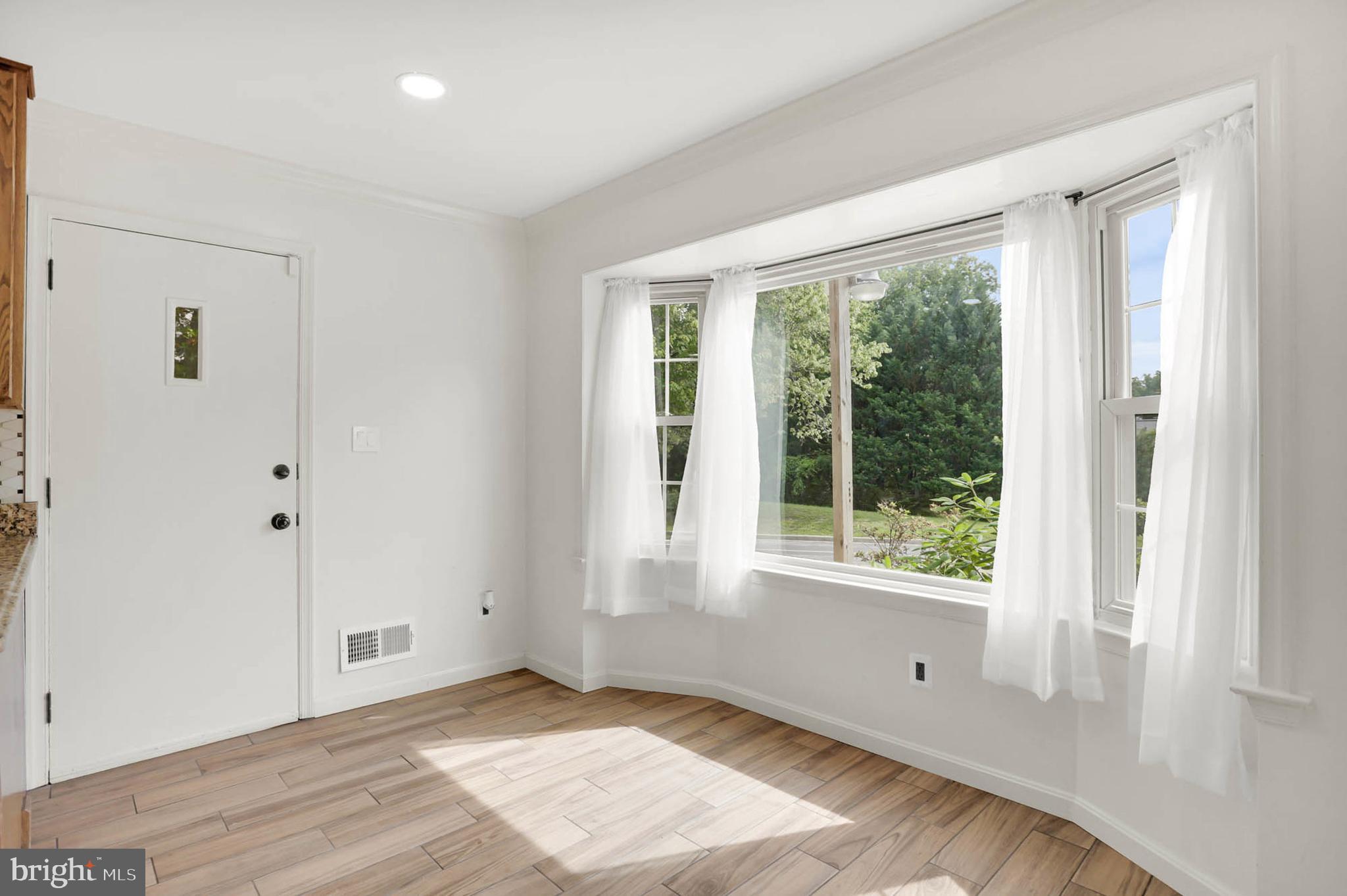 12608 Garden Gate Road Silver Spring, MD 20902 - Photo 11 of 40 Bright Breakfast Room w/ Bay Window