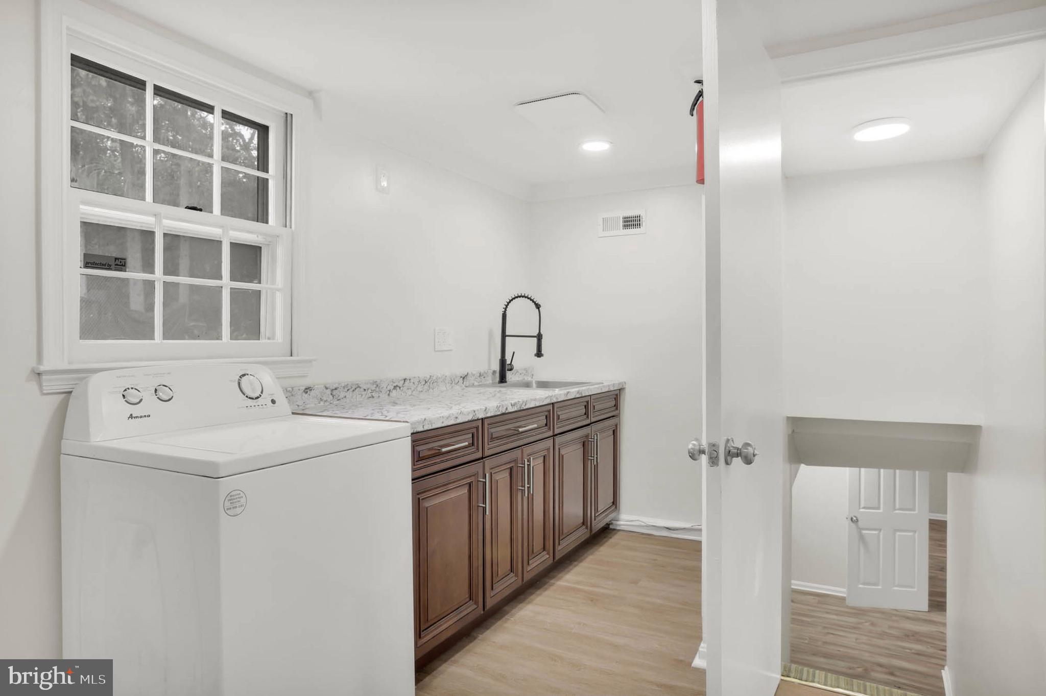 12608 Garden Gate Road Silver Spring, MD 20902 - Photo 27 of 40 2nd level updated laundry room