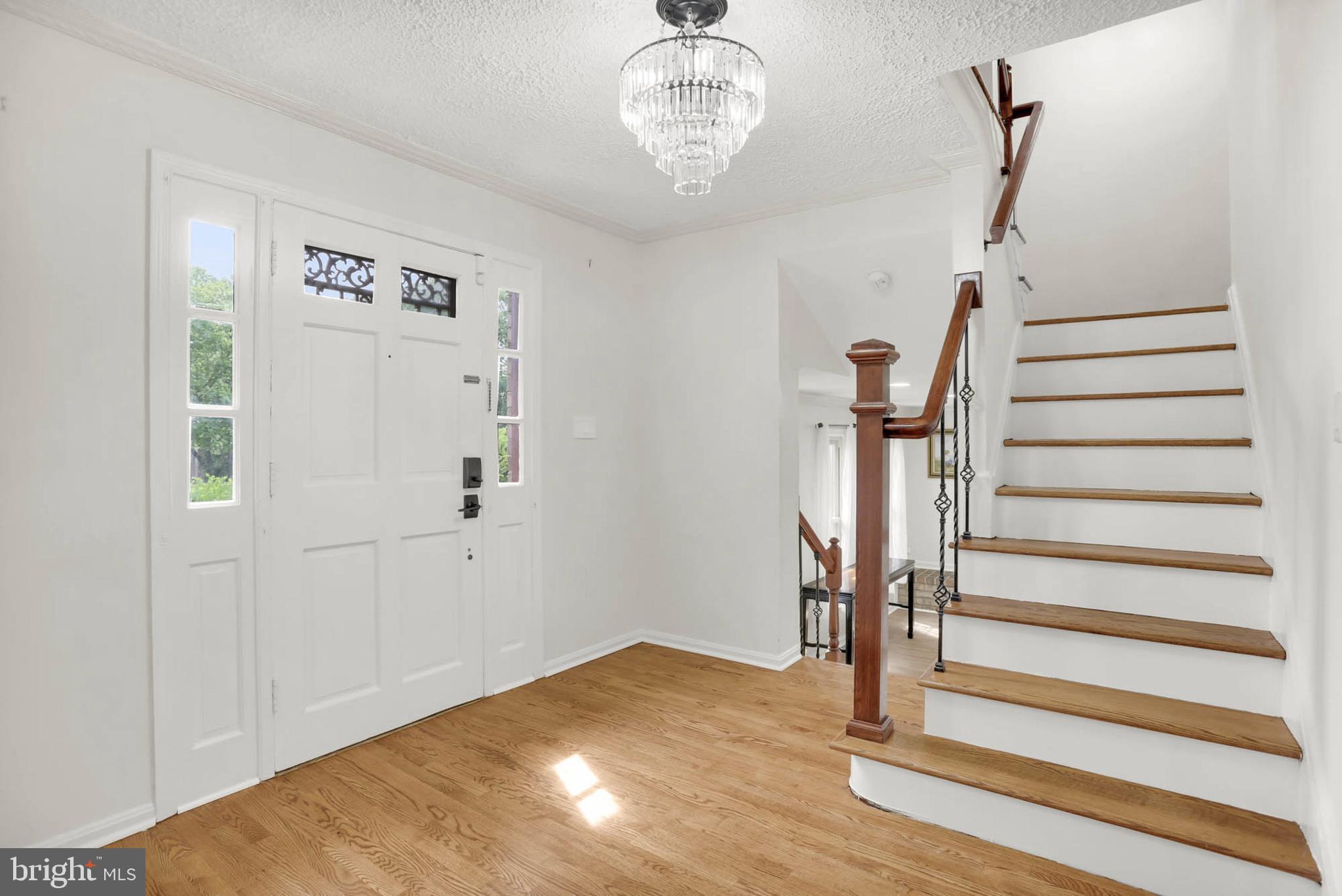 12608 Garden Gate Road Silver Spring, MD 20902 - Photo 3 of 40 Main Lvl Foyer w/ refinished hardwoods throughout
