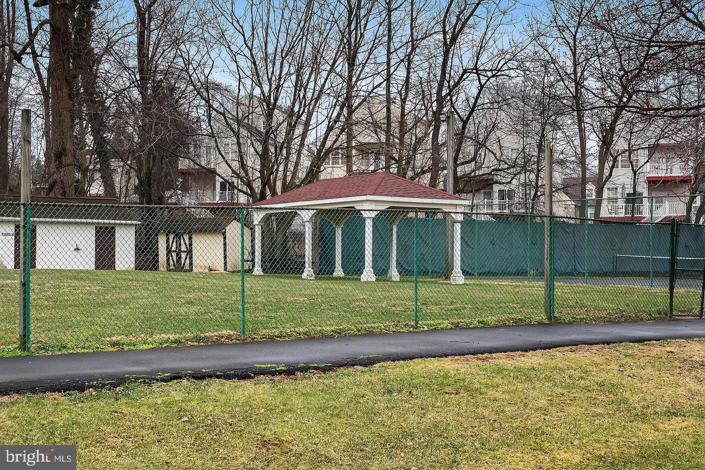 301-00 Byberry Road, Unit F4 Philadelphia, PA 19116 - Photo 13 of 14 a view of a house with a yard