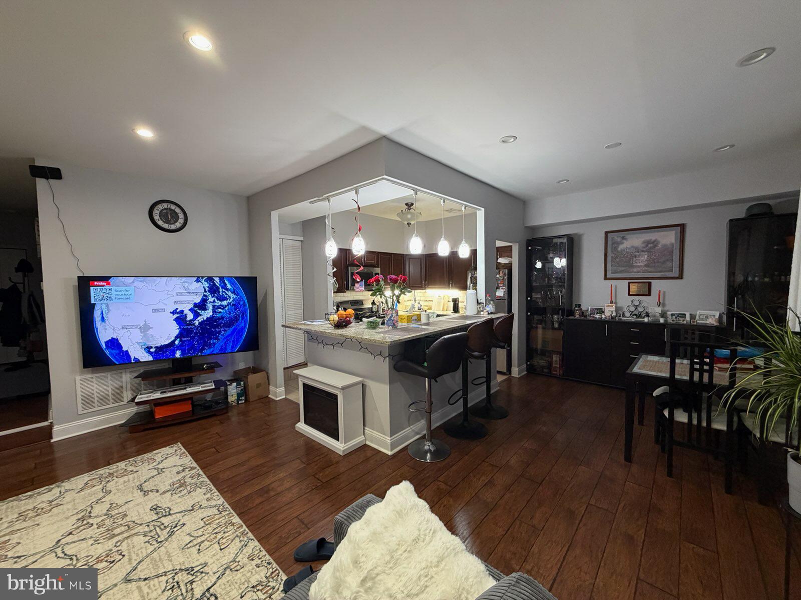 301-00 Byberry Road, Unit F4 Philadelphia, PA 19116 - Photo 5 of 14 a living room with furniture and a flat screen tv