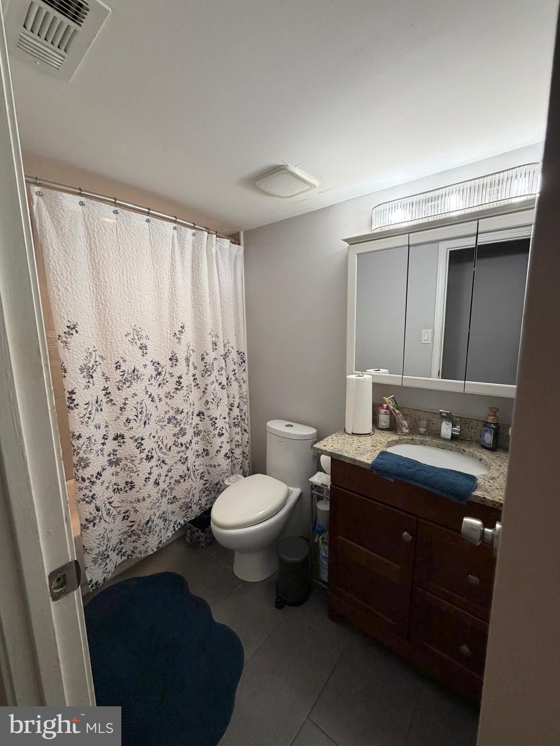 301-00 Byberry Road, Unit F4 Philadelphia, PA 19116 - Photo 10 of 14 a bathroom with a toilet sink and shower