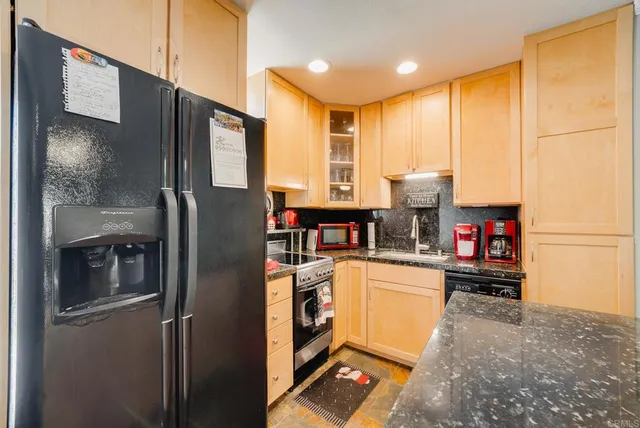 a storage room with lots of wooden furniture