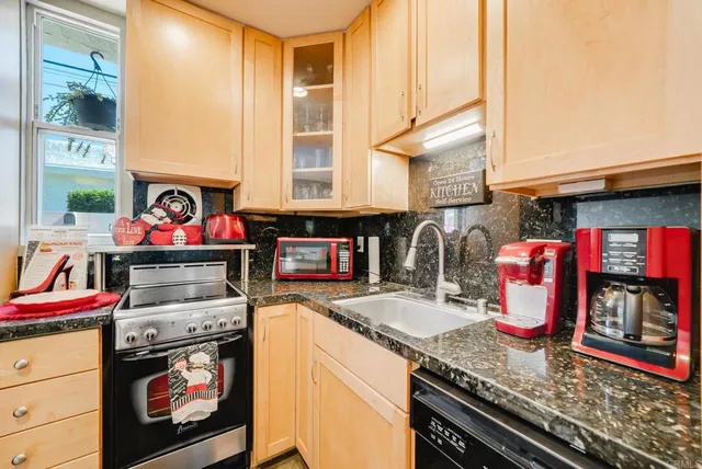 a view of an entrance to house with yard