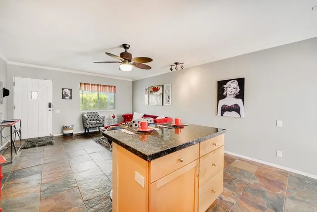 a bathroom with a toilet sink and shower
