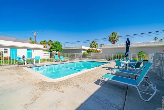 a view of city street with tall buildings