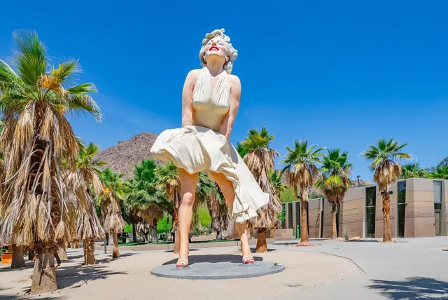 an aerial view of residential building and ocean view
