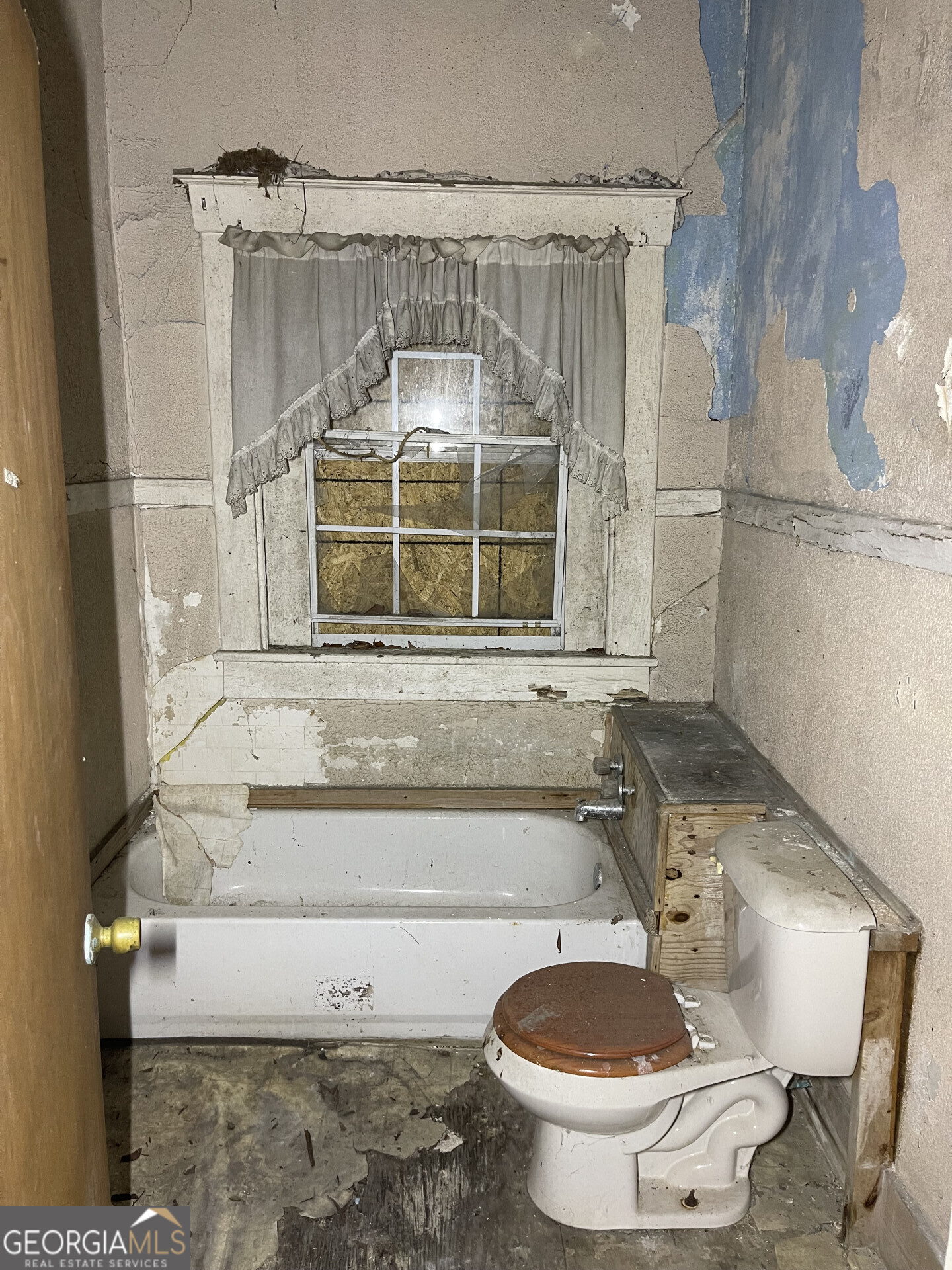 1851 Coleman Avenue Macon, GA 31201 - Photo 14 of 23 a bathroom with a sink and a toilet