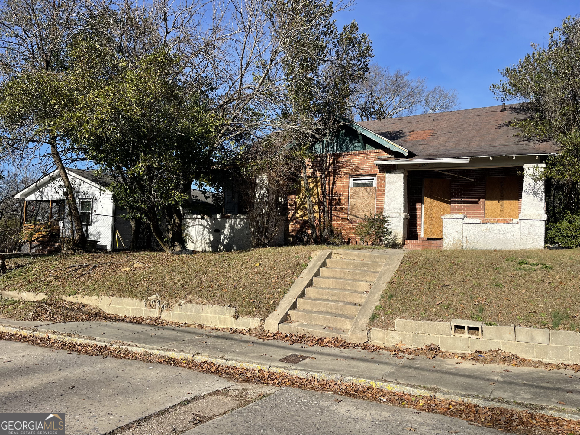 1851 Coleman Avenue Macon, GA 31201 - Photo 2 of 23 a view of a house with snow on the road