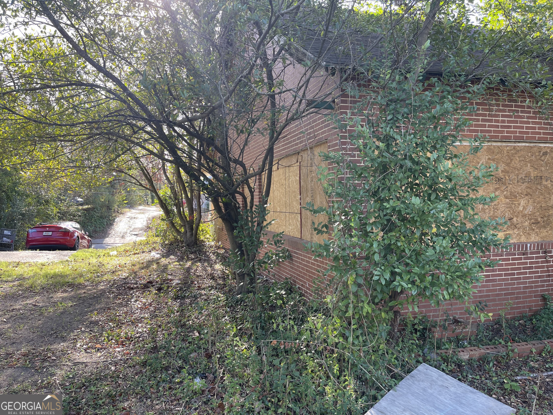 1851 Coleman Avenue Macon, GA 31201 - Photo 5 of 23 a backyard of a house with lots of green space