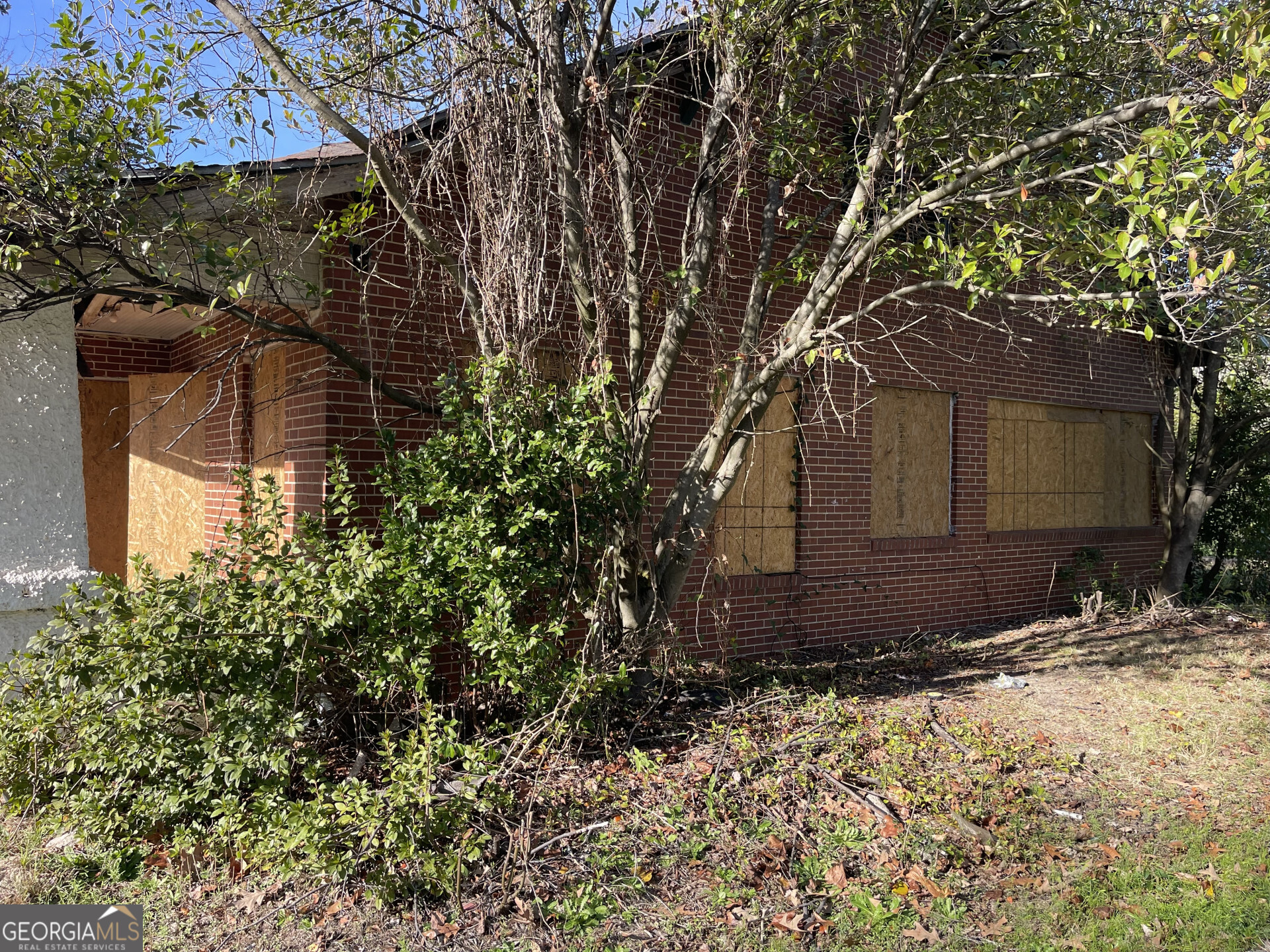 1851 Coleman Avenue Macon, GA 31201 - Photo 10 of 23 a house with trees in front of it
