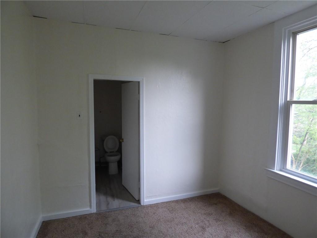 183 West Prospect Avenue, Unit 1B Pittsburgh, PA 15205 - Photo 12 of 17 an empty room with windows