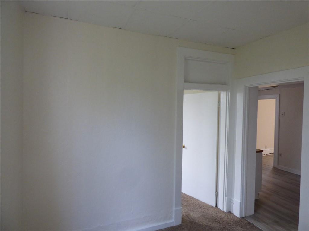 183 West Prospect Avenue, Unit 1B Pittsburgh, PA 15205 - Photo 14 of 17 a view of a hallway with wooden floor