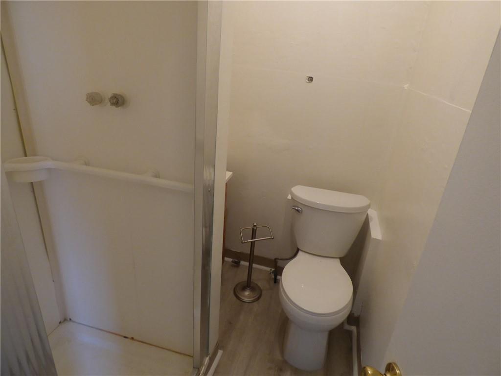 183 West Prospect Avenue, Unit 1B Pittsburgh, PA 15205 - Photo 15 of 17 a white toilet sitting next to a shower