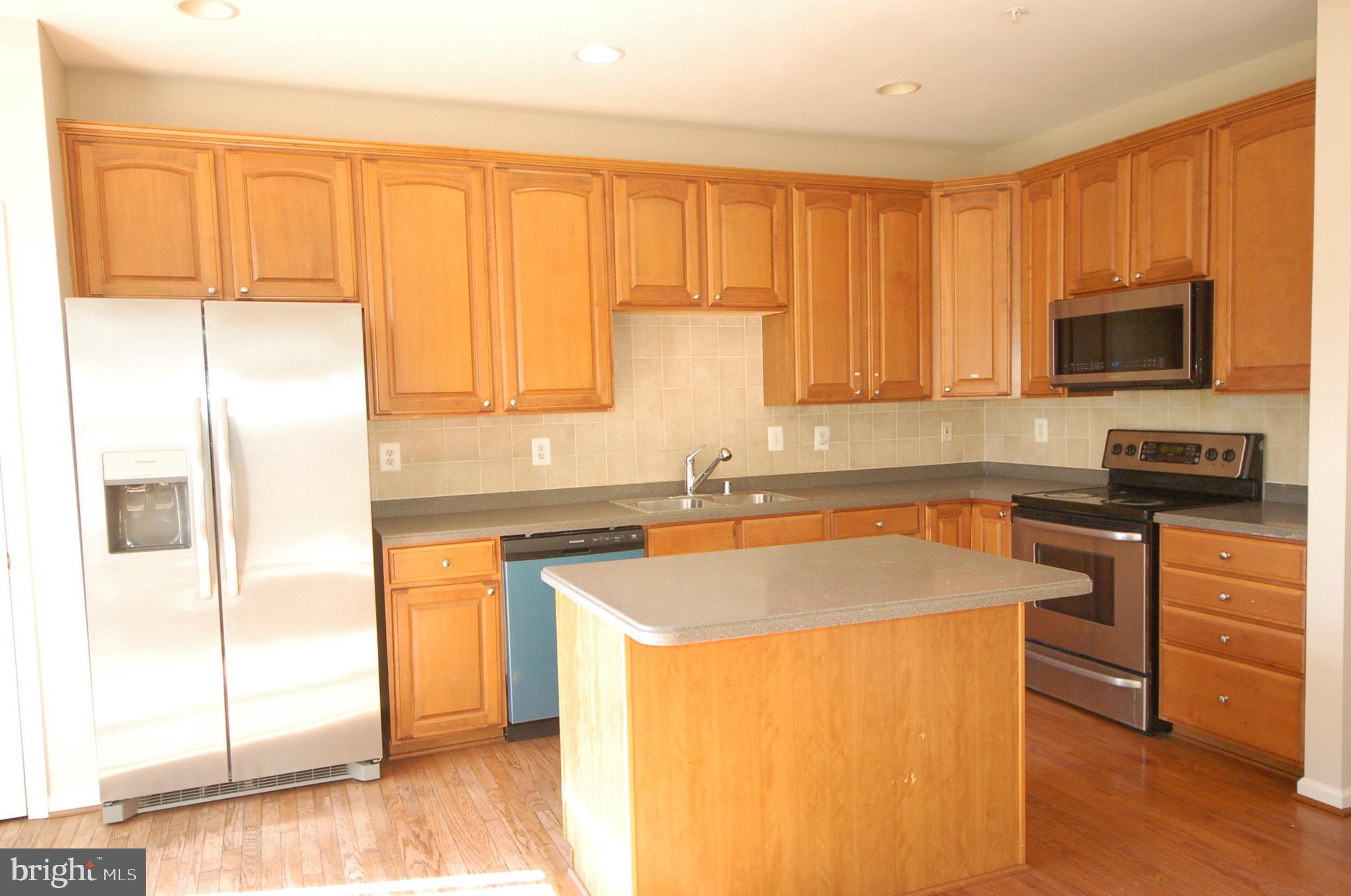 5033 Kemsley Road Rosedale, MD 21237 - Photo 13 of 63 Kitchen features low maintenance Corian Countertop