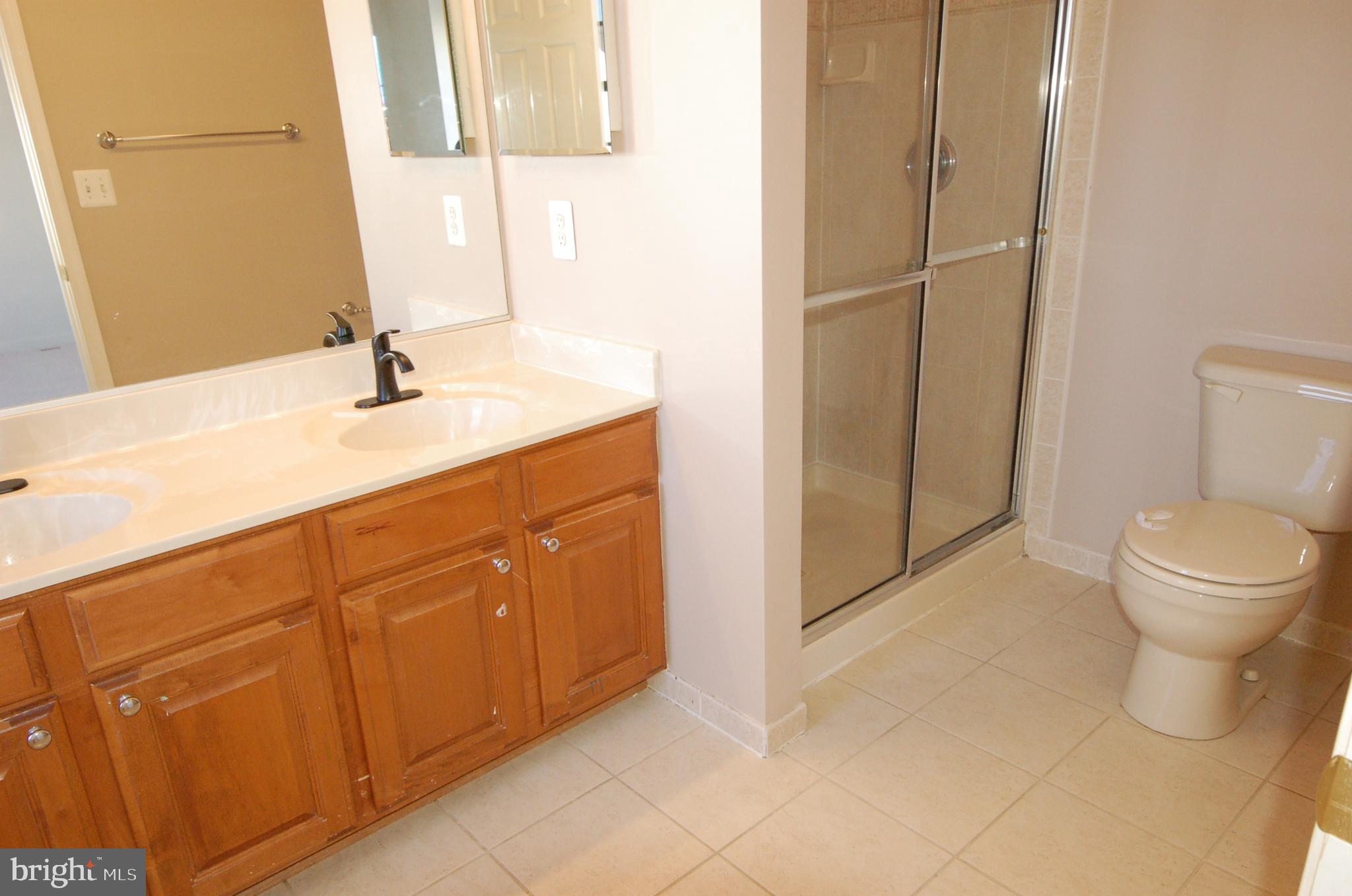 5033 Kemsley Road Rosedale, MD 21237 - Photo 24 of 63 Luxury primary bath separate shower and tub