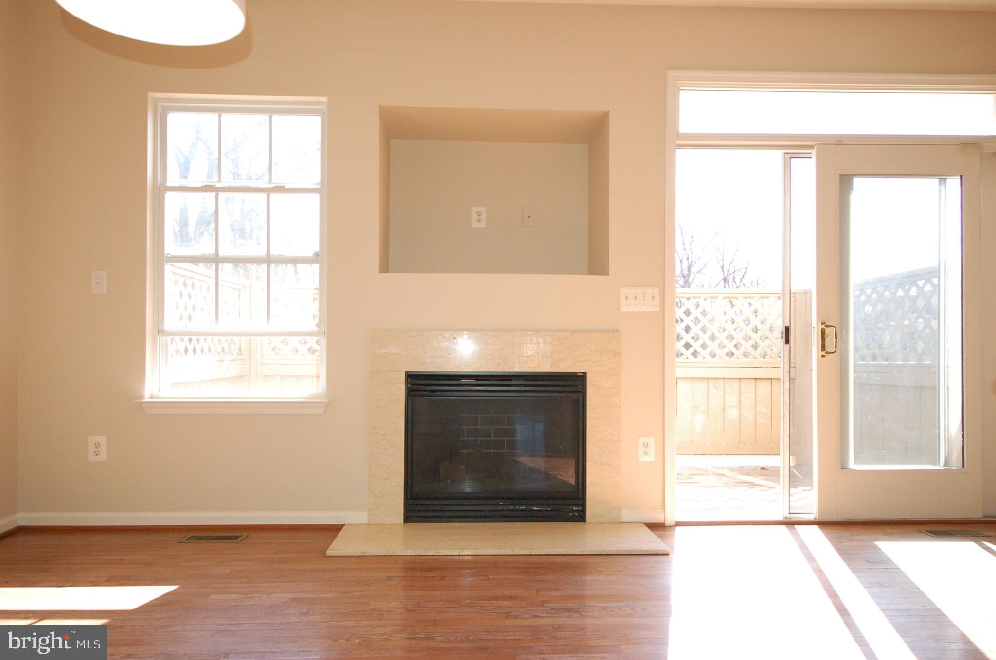 5033 Kemsley Road Rosedale, MD 21237 - Photo 5 of 63 Gas fireplace with marble surrounding