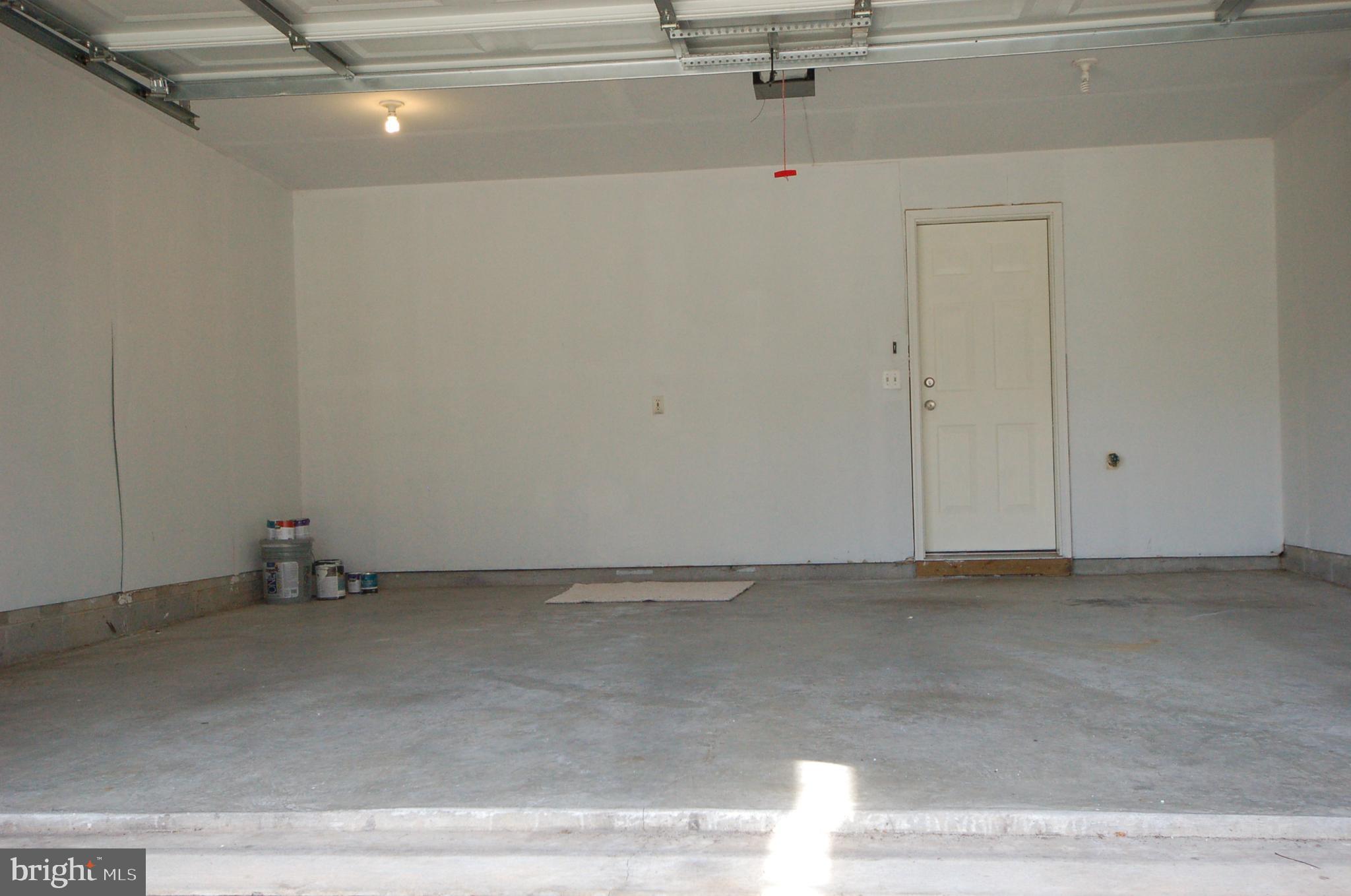 5033 Kemsley Road Rosedale, MD 21237 - Photo 56 of 63 Very clean garage with painted wall/ceiling
