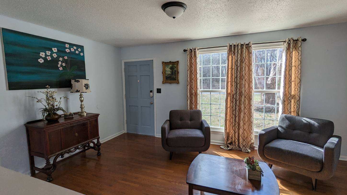569 Lafayette Road Clarksville, TN 37042 - Photo 3 of 25 a living room with furniture and a flat screen tv