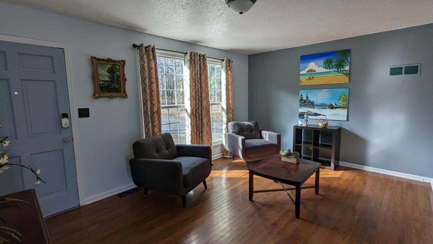 569 Lafayette Road Clarksville, TN 37042 - Photo 5 of 25 a living room with furniture and a window