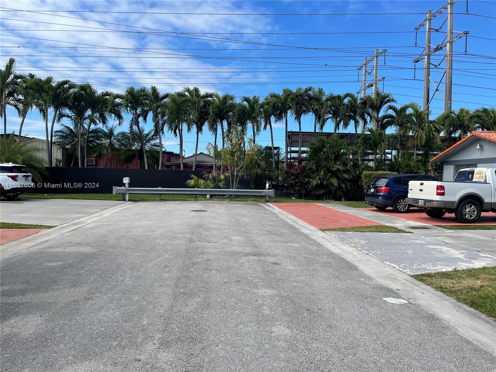 Tamiami Miami, FL 33175 - Photo 3 of 3 a view of road with cars