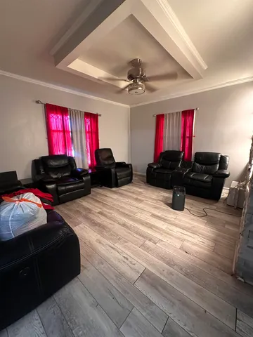 a bedroom with bed and a window