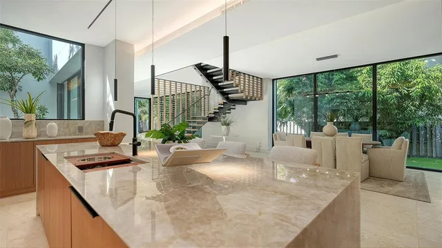 a view of a dining room with furniture window and outside view