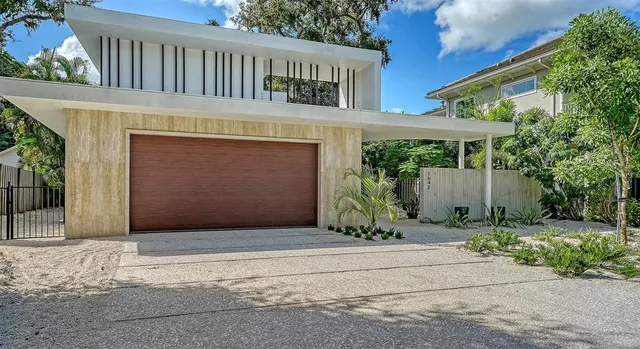 a dining room with furniture and a table