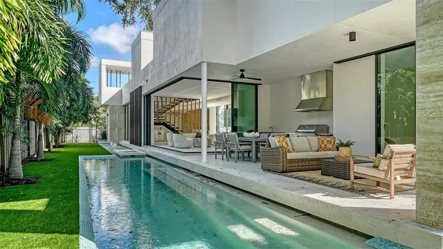 a view of small space with wooden floor and a window