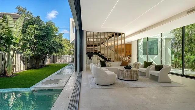 a view of an entryway with wooden floor