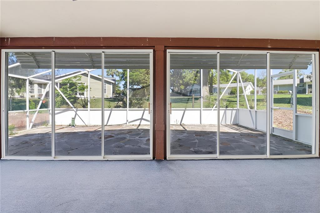 8105 Southwest 109th Street Ocala, FL 34481 - Photo 23 of 30 a view of empty room with floor to ceiling window