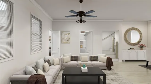 a living room with furniture a rug and a window