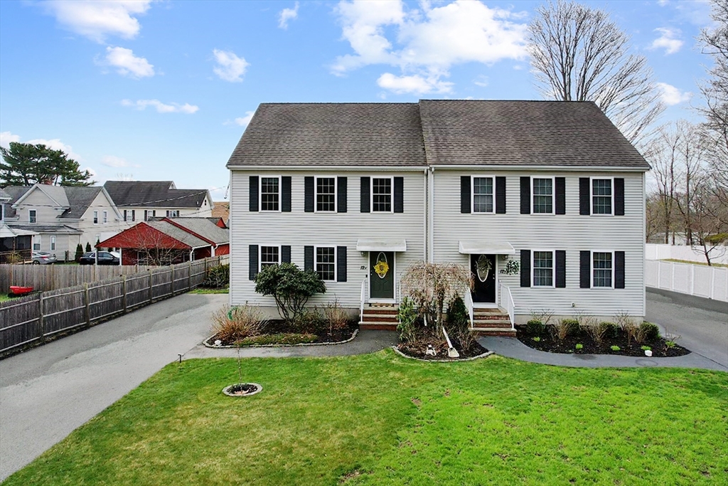12 Pinckney Street, Unit A Taunton, MA 02780 - Photo 1 of 42 a house that has sitting area in front of it
