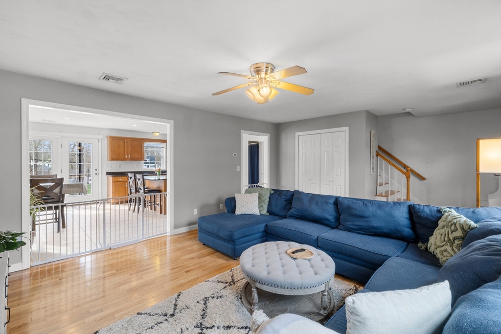 12 Pinckney Street, Unit A Taunton, MA 02780 - Photo 12 of 42 a living room with furniture and wooden floor