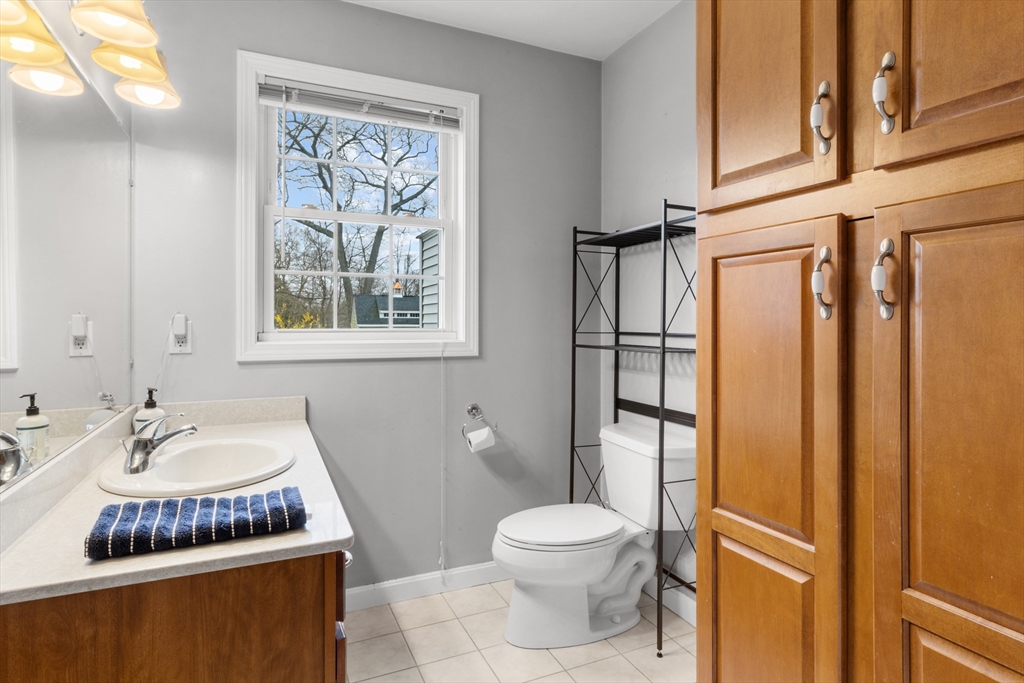 12 Pinckney Street, Unit A Taunton, MA 02780 - Photo 17 of 42 a bathroom with a sink a toilet and shower