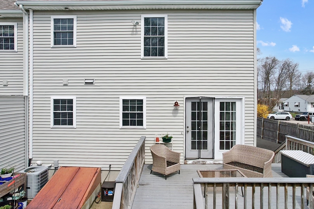 12 Pinckney Street, Unit A Taunton, MA 02780 - Photo 36 of 42 a view of a house with a deck